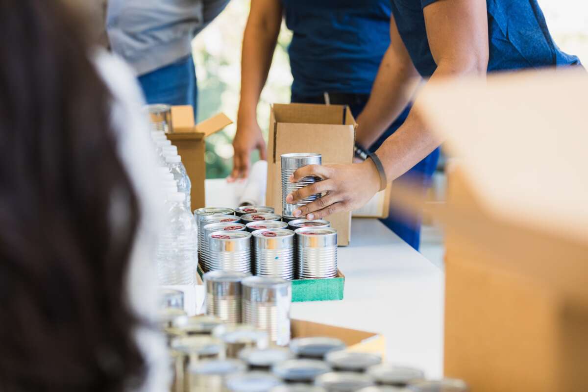 people sorting donated food