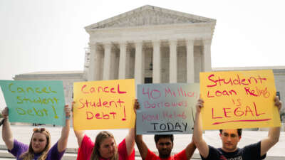 Student Debt relief advocates stand outside of the Supreme Court of the United States as they wait for the Supreme Court to release their opinion on wether or not to strike down President Biden's student debt relief program on Friday, June 30, 2023, in Washington, D.C.