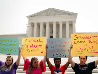 Student Debt relief advocates stand outside of the Supreme Court of the United States as they wait for the Supreme Court to release their opinion on wether or not to strike down President Biden's student debt relief program on Friday, June 30, 2023, in Washington, D.C.