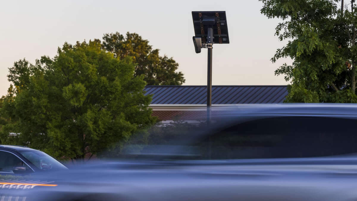 Cars drive by a Flock camera, an automated license plate reader, on East Little Creek Road in Norfolk, Virginia, on May 21, 2024.