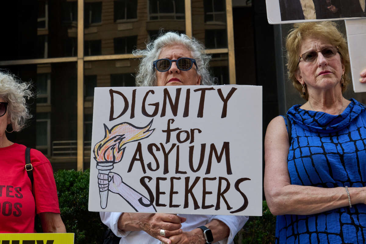Supporters of immigrant rights protest outside the immigration court in the Jacob K. Javits Federal Building in New York City on July 24, 2025.
