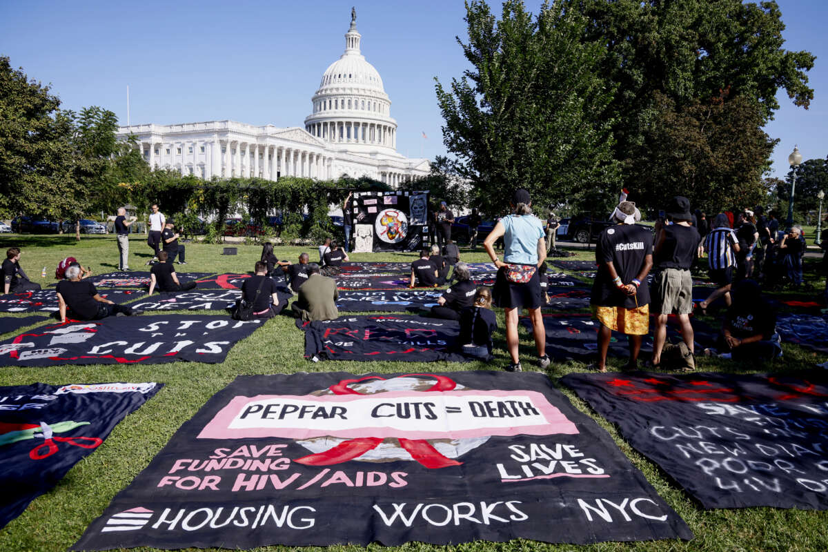 Organizers of the Save HIV Funding Campaign highlight the lives at stake if Congress fails to fund HIV services in the U.S. on September 5, 2025, in Washington, D.C.