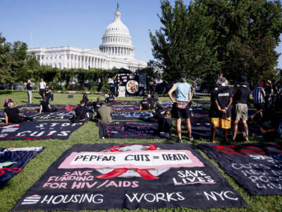 Organizers of the Save HIV Funding Campaign highlight the lives at stake if Congress fails to fund HIV services in the U.S. on September 5, 2025, in Washington, D.C.