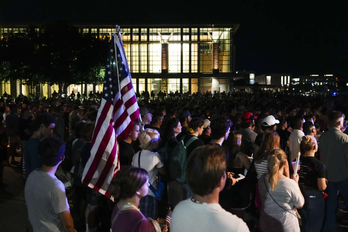 People gather as members of Turning Point USA and other campus organizations take part in a vigil for Charlie Kirk on the campus of Texas A&M University in College Station, Texas, on September 11, 2025.