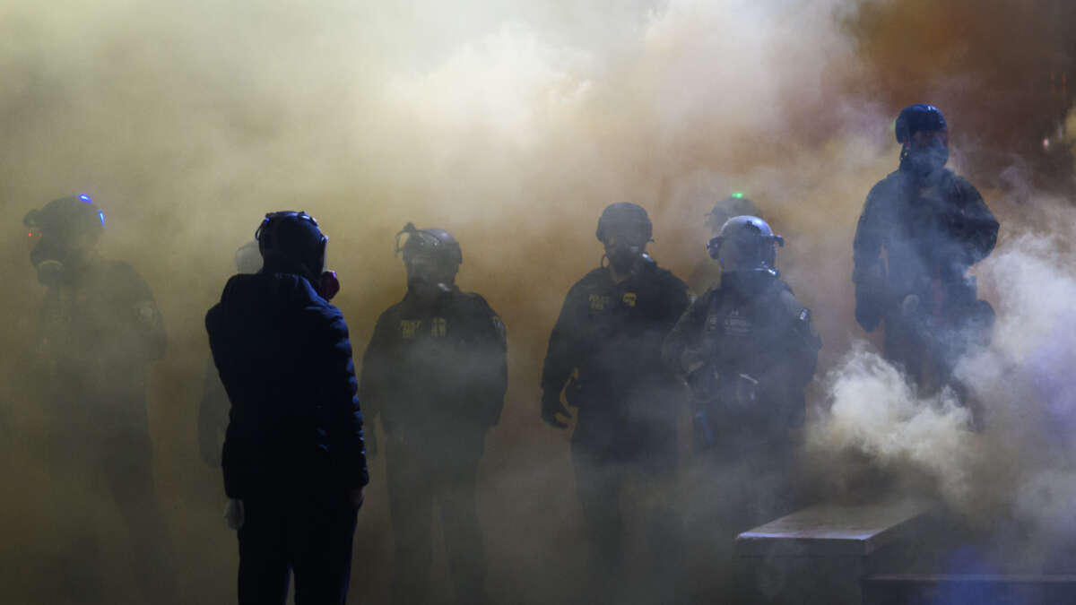 Anti-ICE protesters clash with federal agents at the U.S. Immigration and Customs Enforcement building in Portland, Oregon, on October 18, 2025.