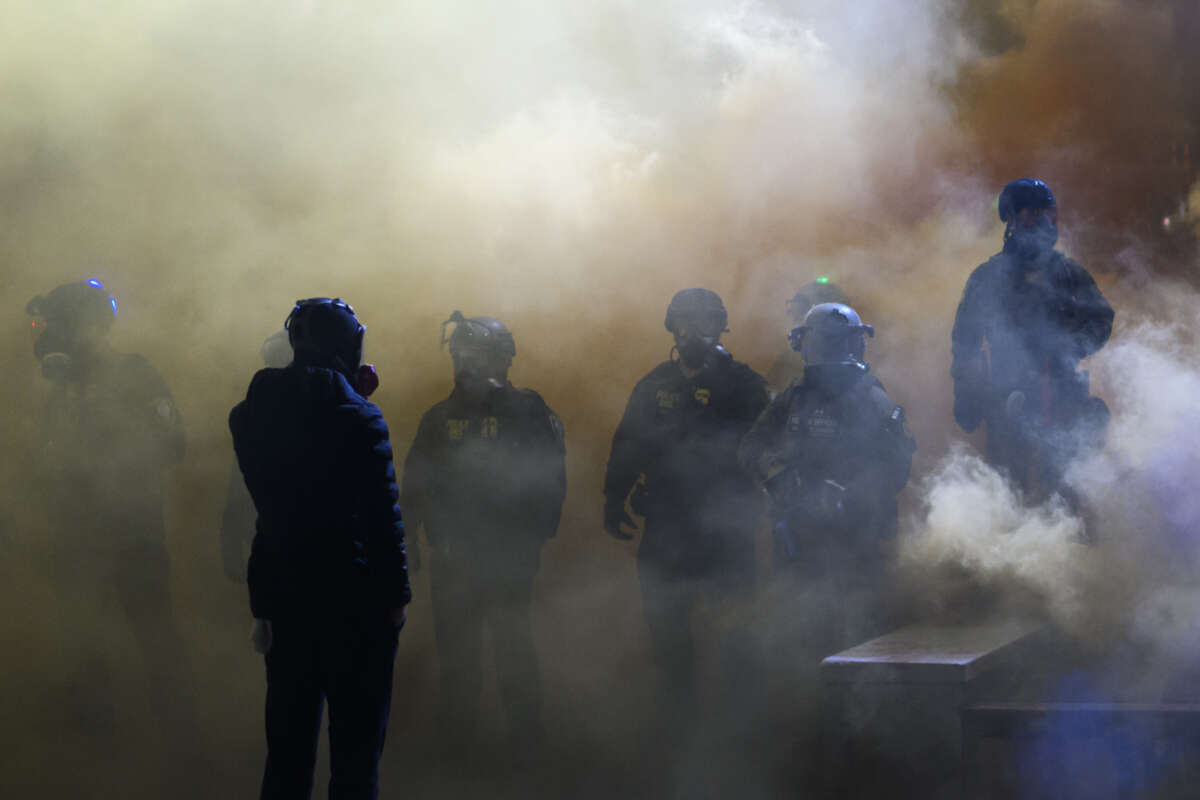 Anti-ICE protesters clash with federal agents at the U.S. Immigration and Customs Enforcement building in Portland, Oregon, on October 18, 2025.