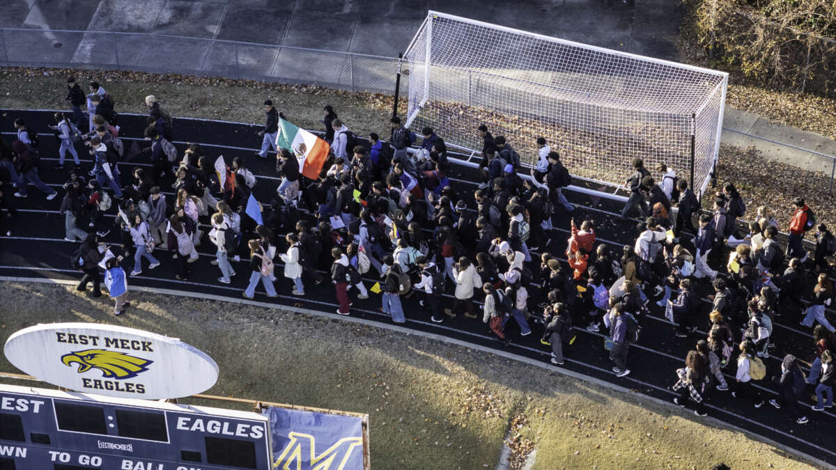 Students stage a walkout at East Mecklenburg High School in protest of U.S. Border Patrol operations targeting undocumented immigrants on November 18, 2025, in Charlotte, North Carolina.