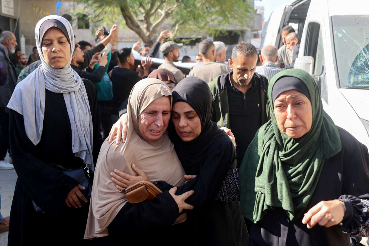 Mourners attend the funeral of Palestinians who were killed by Israeli strikes on November 23, 2025.