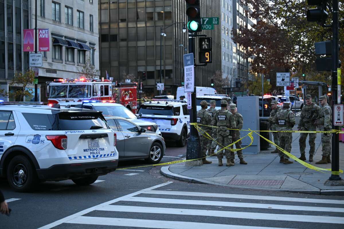 National Guard soldiers gather near the scene of a shooting in downtown Washington, D.C., on November 26, 2025.