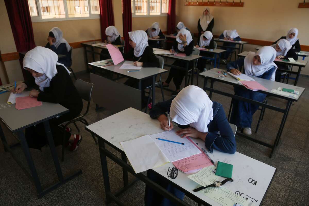 Palestinian high school students take their final exams in Gaza City on June 3, 2017.