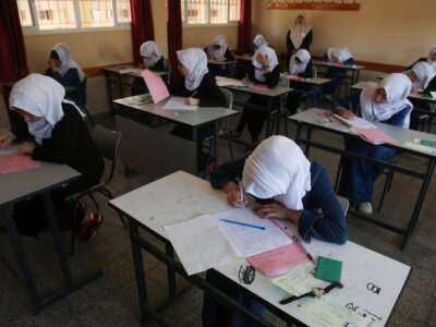 Palestinian high school students take their final exams in Gaza City on June 3, 2017.