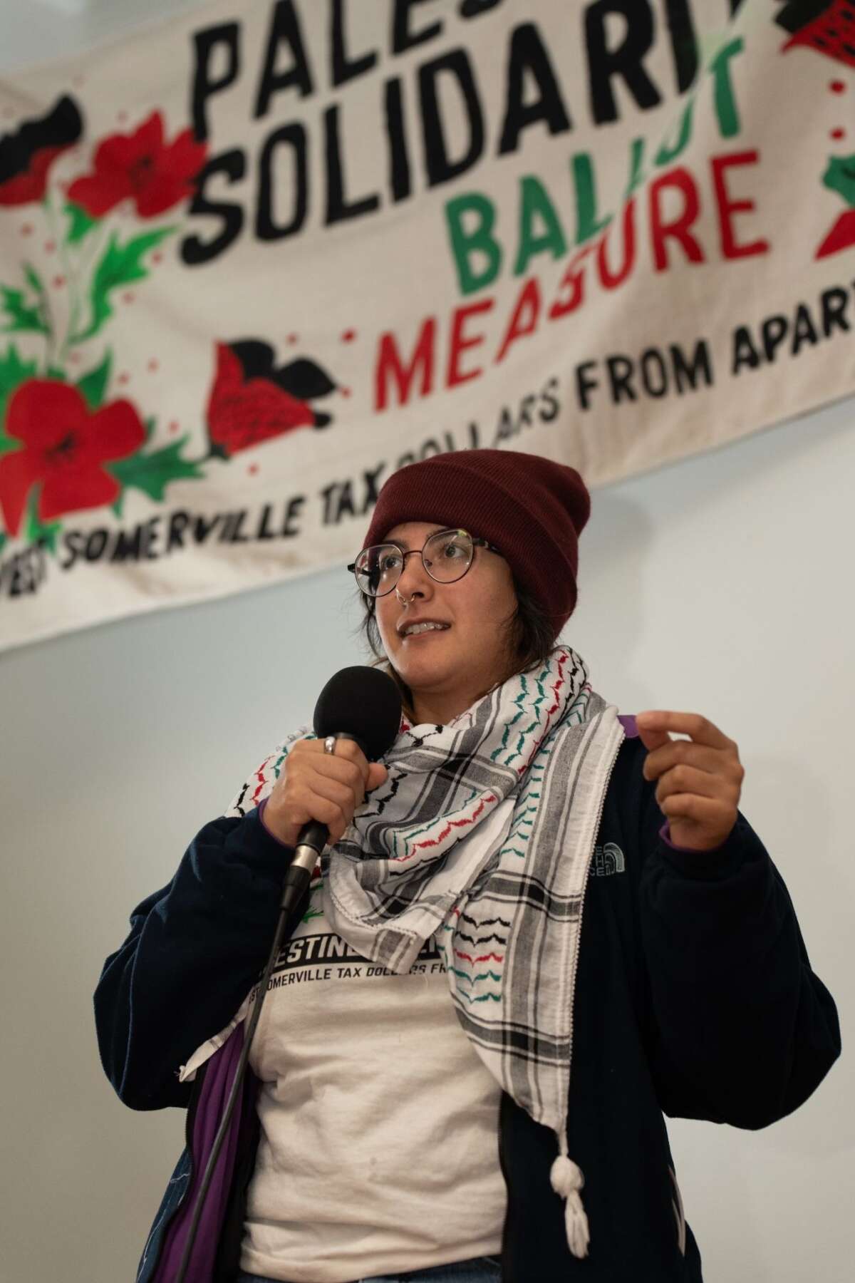 Amina Awad, Palestinian-American Somerville resident and campaign organizer, celebrates victory.