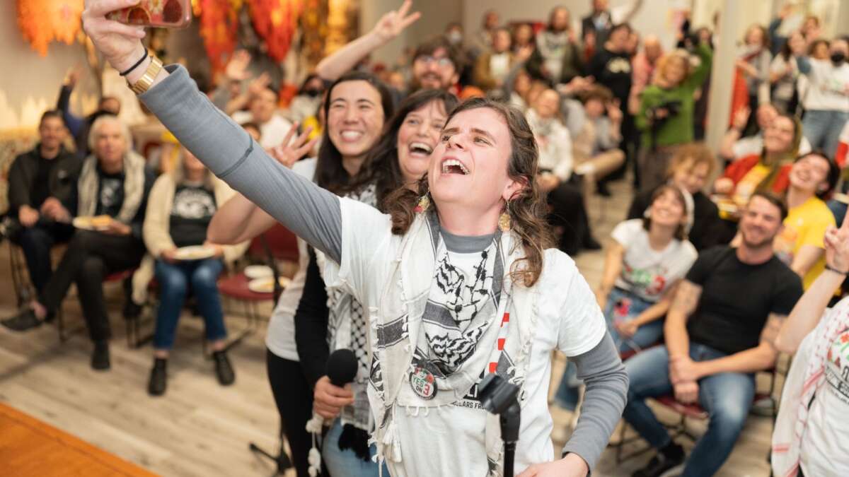 Organizers with Somerville for Palestine and State Rep Erika Uyterhoeven take a selfie documenting Somerville’s historic victory for Palestine.