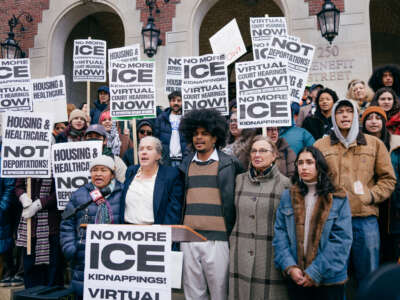 Community members protest the presence of ICE and hold a press conference demanding virtual hearings at the Garrahy courthouse in Providence, Rhode Island, on November 20, 2025.