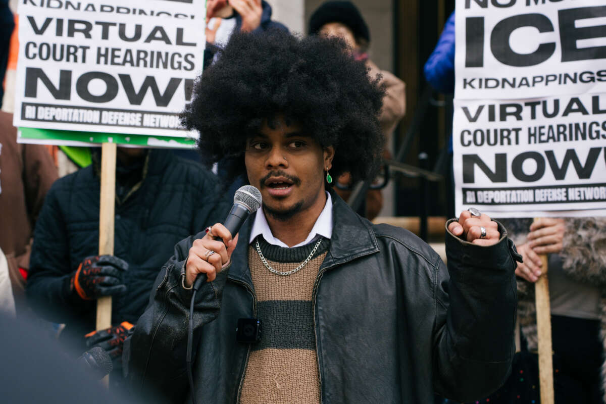 A community member speaks during a press conference demanding virtual hearings at the Garrahy courthouse in Providence, Rhode Island, on November 20, 2025.