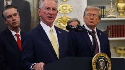 Sen. Tommy Tuberville speaks as President Donald Trump looks on in the Oval Office at the White House on September 2, 2025 in Washington, D.C.