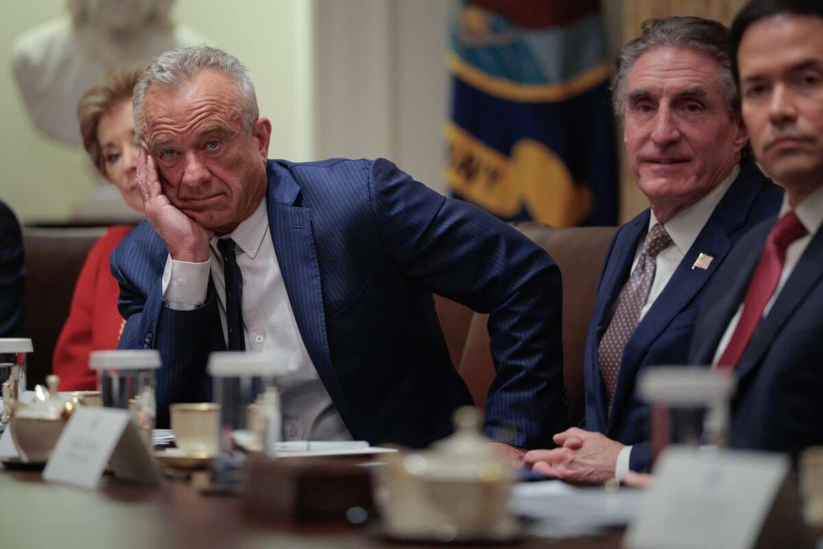 Members of U.S. President Donald Trump's cabinet (L-R) Health and Human Services Secretary Robert F. Kennedy Jr., Interior Secretary Doug Burgum, and Secretary of State Marco Rubio attend a meeting in the Cabinet Room of the White House on December 2, 2025 in Washington, D.C.