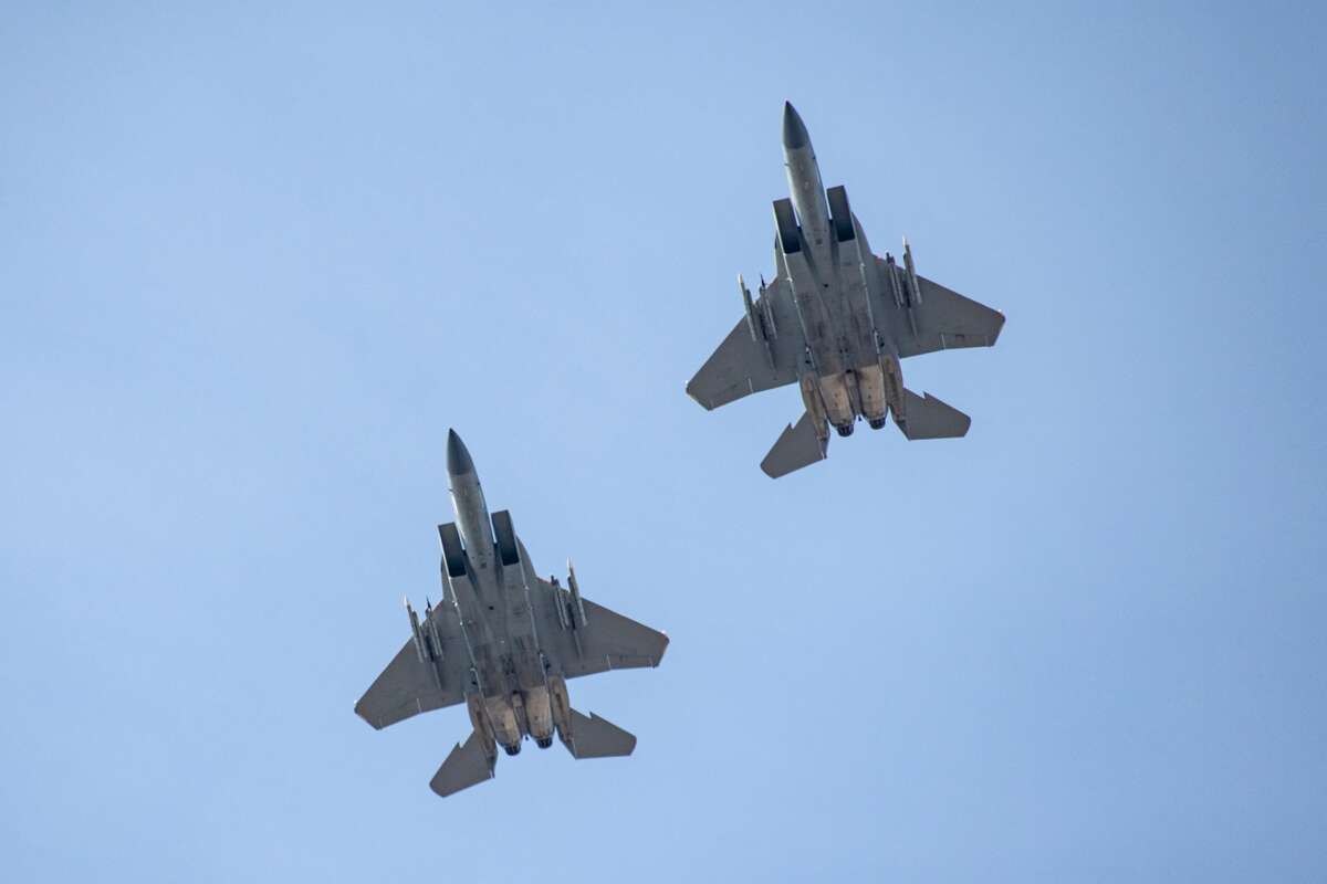 F-15 Eagle fighter jets fly over the race course during the 129th Boston Marathon on April 21, 2025, in Boston, Massachusetts.