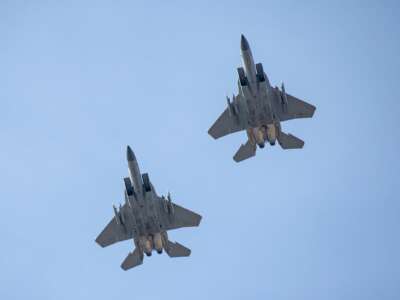 F-15 Eagle fighter jets fly over the race course during the 129th Boston Marathon on April 21, 2025, in Boston, Massachusetts.