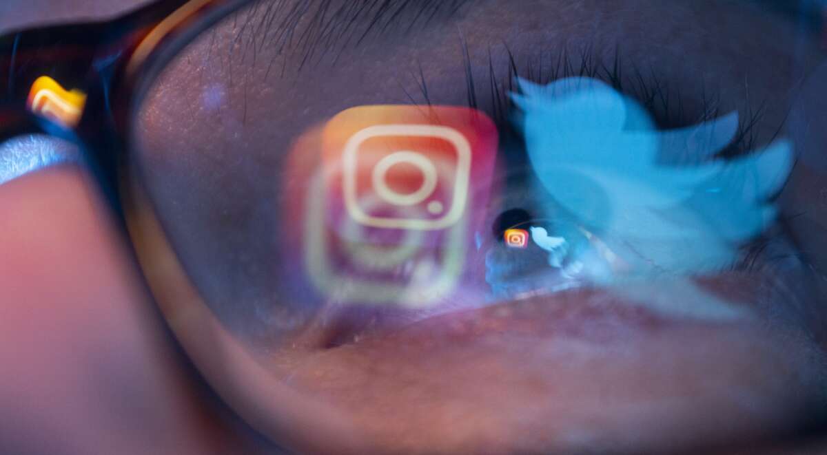 A Twitter logo and an Instagram logo are seen in this illustration photo from 2023.