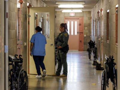 An officer opens a dorm room for a prisoner inside C block at the Central California Women's Facility on June 18, 2024, in Chowchilla, California.