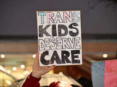 Protesters demonstrate outside Children's Hospital Los Angeles on February 6, 2025, in the wake of Donald Trump's executive order threatening to pull federal funding from health care providers who offer gender-affirming care to children.