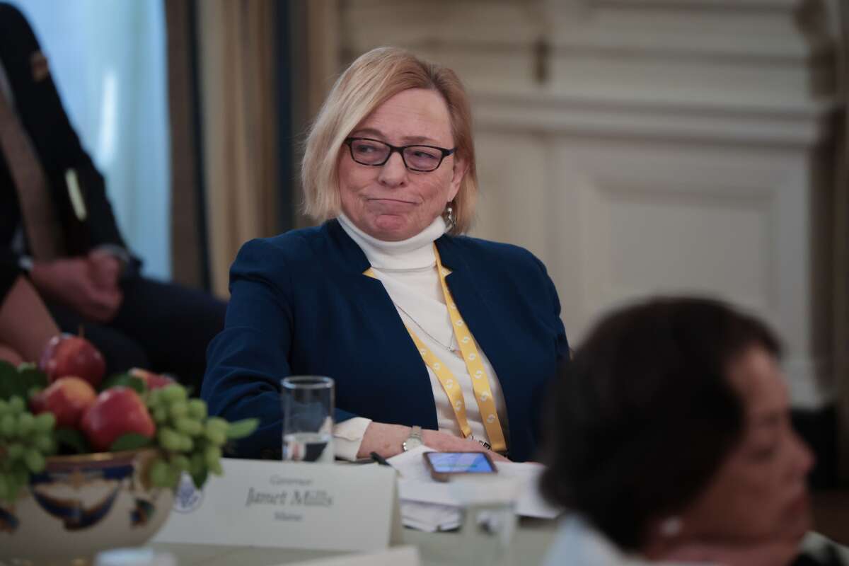 Maine Gov. Janet Mills reacts after challenging President Donald Trump over federal law on the issue of trans women in sports as Trump addressed a meeting of governors at the White House on February 21, 2025, in Washington, D.C.