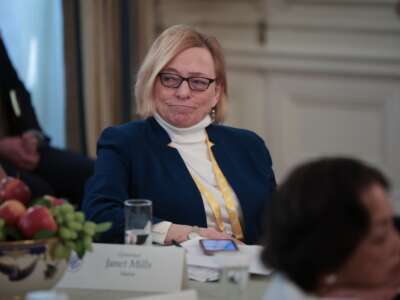 Maine Gov. Janet Mills reacts after challenging President Donald Trump over federal law on the issue of trans women in sports as Trump addressed a meeting of governors at the White House on February 21, 2025, in Washington, D.C.