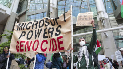 Pro-Palestinian demonstrators protest outside the Microsoft Build conference at the Seattle Convention Center in Seattle, Washington, on May 19, 2025.