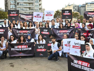 Medecins Sans Frontieres (Doctors Without Borders), in collaboration with Amel International, holds a solidarity vigil in Martyrs' Square in Beirut, Lebanon, on September 15, 2025.