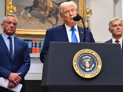 President Donald Trump, alongside Secretary of Health and Human Services Robert F. Kennedy Jr. and Medicare and Medicaid Administrator Mehmet Oz, speaks about autism in the Roosevelt Room of the White House in Washington, D.C., on September 22, 2025.