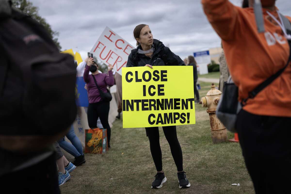 Demonstrators protest outside of the immigration processing and detention facility on October 11, 2025, in Broadview, Illinois.