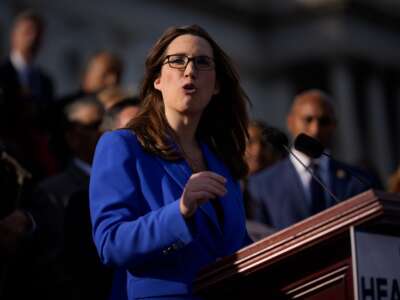 Rep. Sarah McBride (D-Delaware), joined by fellow House Democrats, speaks on the House steps on November 12, 2025, in Washington, D.C.
