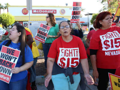 Employees protest for a higher minimum wage outside of a McDonald's in Las Vegas, Nevada, on May 24, 2017.