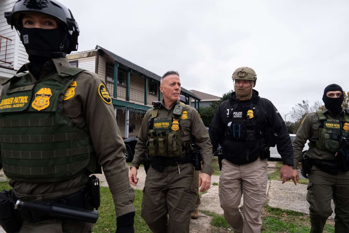 Border Patrol Commander Gregory Bovino (center) leads an immigration raid in Kenner, Louisiana, on December 5, 2025.