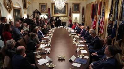 Donald Trump holds a meeting of his cabinet in the Cabinet Room of the White House on December 2, 2025, in Washington, D.C. A bipartisan congressional investigation has begun regarding Secretary of War Pete Hegseth's role in ordering U.S. military strikes on small boats in the waters off Venezuela that have killed scores of people.