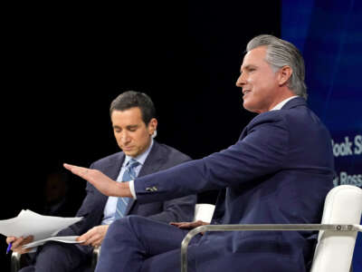 (L-R) Andrew Ross Sorkin and Governor of California Gavin Newsom speak onstage during The New York Times DealBook Summit 2025 at Jazz at Lincoln Center on December 3, 2025, in New York City.