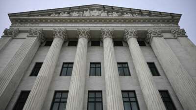 A view of the rear side of the U.S. Supreme Court as the court hears arguments in the case over Donald Trump's dismissal of Federal Trade Commission commissioner Rebecca Slaughter in Washington, D.C., on December 8, 2025. The case is being closely watched due to its broader implications concerning the president's powers to fire the heads of independent government agencies.