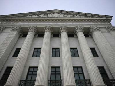 A view of the rear side of the U.S. Supreme Court as the court hears arguments in the case over Donald Trump's dismissal of Federal Trade Commission commissioner Rebecca Slaughter in Washington, D.C., on December 8, 2025. The case is being closely watched due to its broader implications concerning the president's powers to fire the heads of independent government agencies.