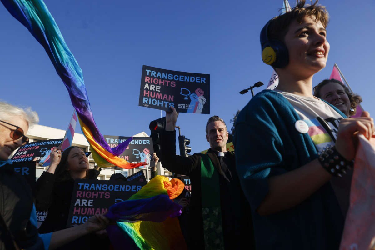 Members of Rainbow Families Action march from Bay Street in Emeryville, California, on December 8, 2025, to the Sutter corporate offices on Powell Street to protest the end of gender-affirming care for patients under age 19.