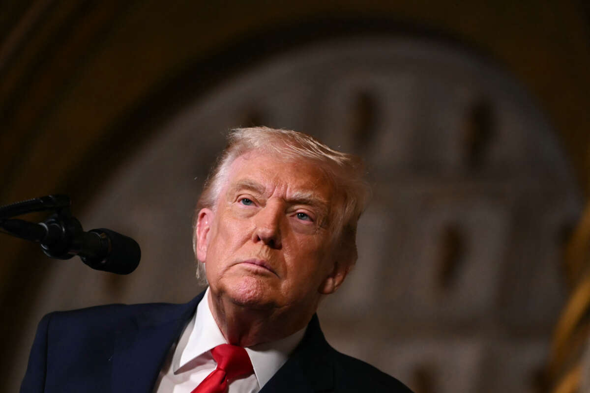 U.S. President Donald Trump takes questions from journalists after announcing the U.S. Navy's new Golden Fleet initiative, unveiling a new class of warships, at Mar-a-Lago in Palm Beach, Florida, on December 22, 2025.