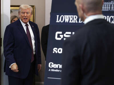 Donald Trump departs after delivering remarks on lowering prescription drug prices at an event in the Roosevelt Room of the White House on December 19, 2025, in Washington, D.C.