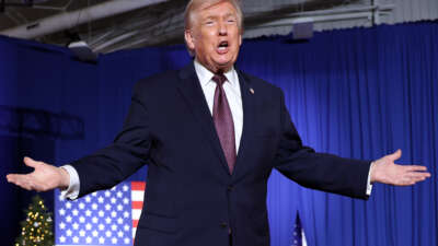 President Donald Trump takes the stage during a rally at the Rocky Mount Event Center on December 19, 2025, in Rocky Mount, North Carolina.