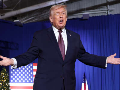 President Donald Trump takes the stage during a rally at the Rocky Mount Event Center on December 19, 2025, in Rocky Mount, North Carolina.
