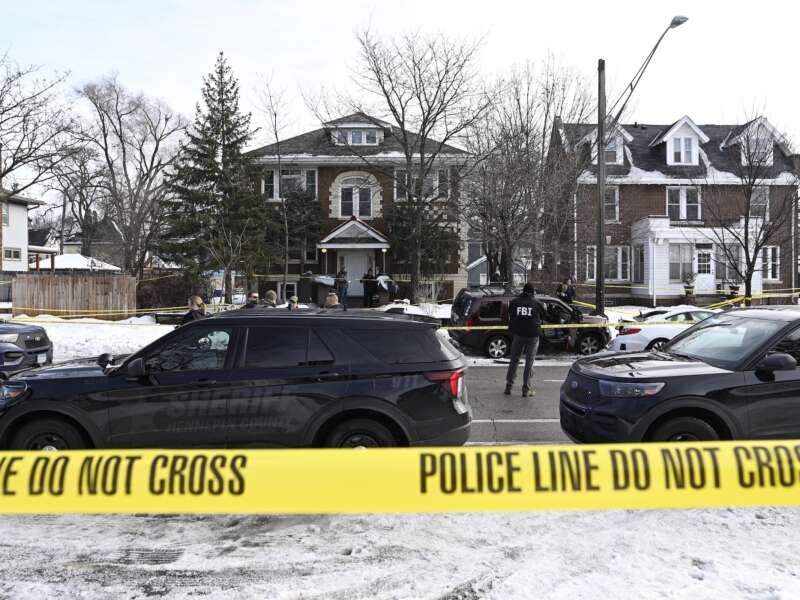 Members of law enforcement work the scene following a suspected shooting by a federal agent during law enforcement operations on January 7, 2026 in Minneapolis, Minnesota.