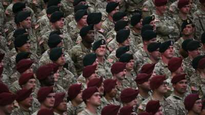 Members of the U.S. army listen as President Donald Trump speaks at Fort Bragg, a U.S. Army military installation, near Fayetteville, North Carolina, on June 10, 2025.