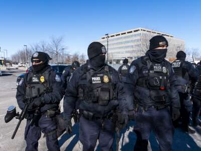 Department of Homeland Security police officers arrest a person outside of the Bishop Henry Whipple Federal Building on January 14, 2026 in Minneapolis, Minnesota.