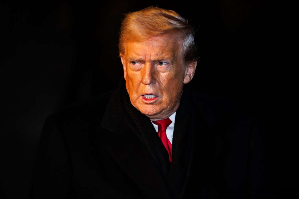 President Donald Trump speaks to reporters before departing from the South Lawn of the White House on January 20, 2026 in Washington, D.C.