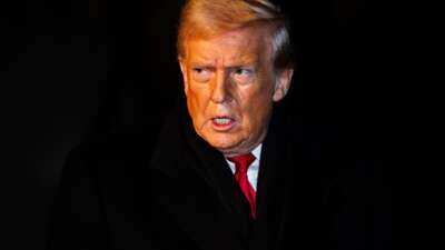 President Donald Trump speaks to reporters before departing from the South Lawn of the White House on January 20, 2026 in Washington, D.C.