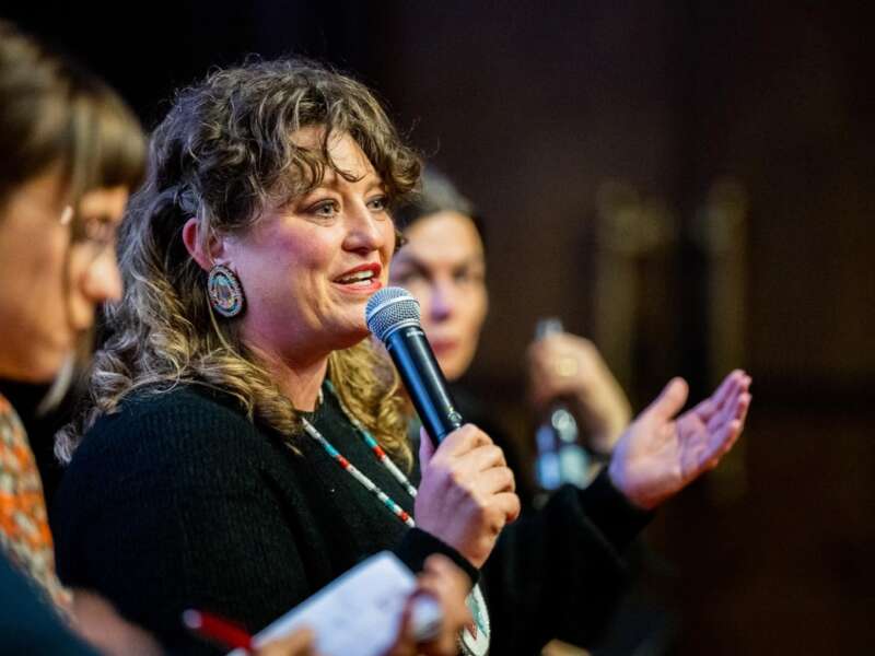 Angel Ellis speaking at the Millennium Docs Against Gravity Film Festival in Poland, 2023, where the documentary Bad Press was screened.